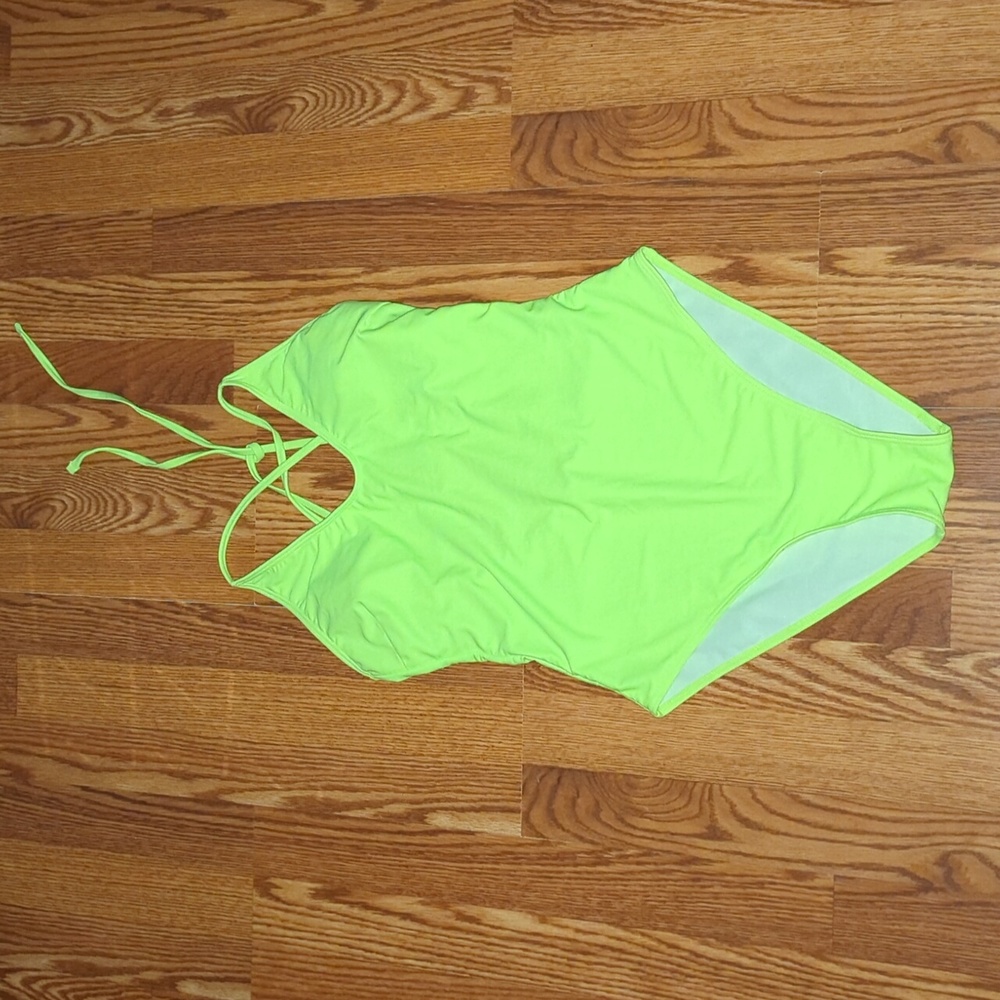 Women's new with tags size large, one piece neon green swimsuit